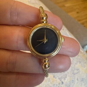 Gold and Black Women's Bangle Watch